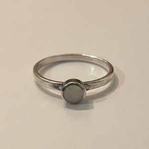 Sterling Silver ring with a single moonstone.